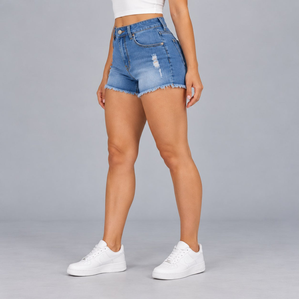 Sculpt Denim Shorts in mid blue, three-quarter front view