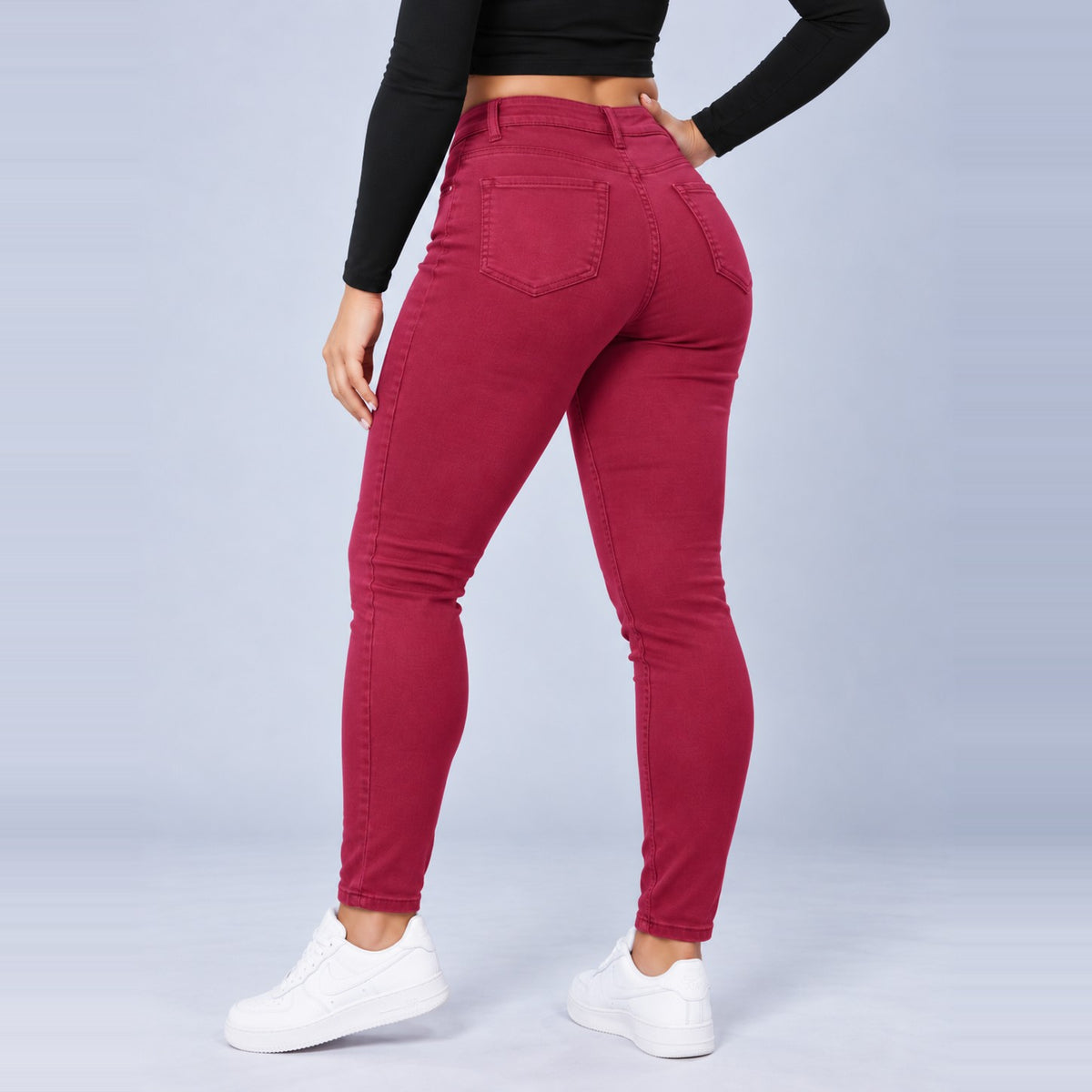 Sculpt Skinny BBL jean in berry, back view, hand on hip