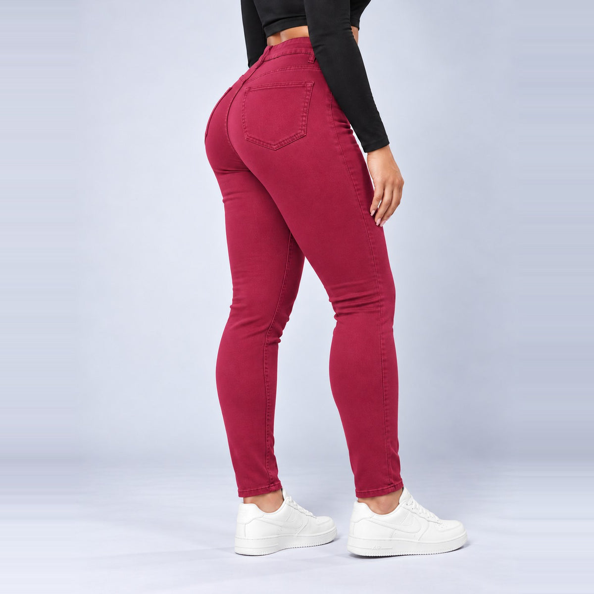 Sculpt Skinny BBL jean in berry, side view