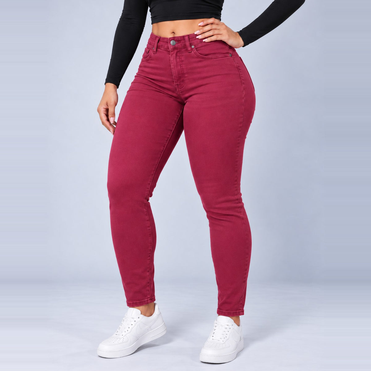 Sculpt Skinny BBL jean in berry, front view, hand on hip