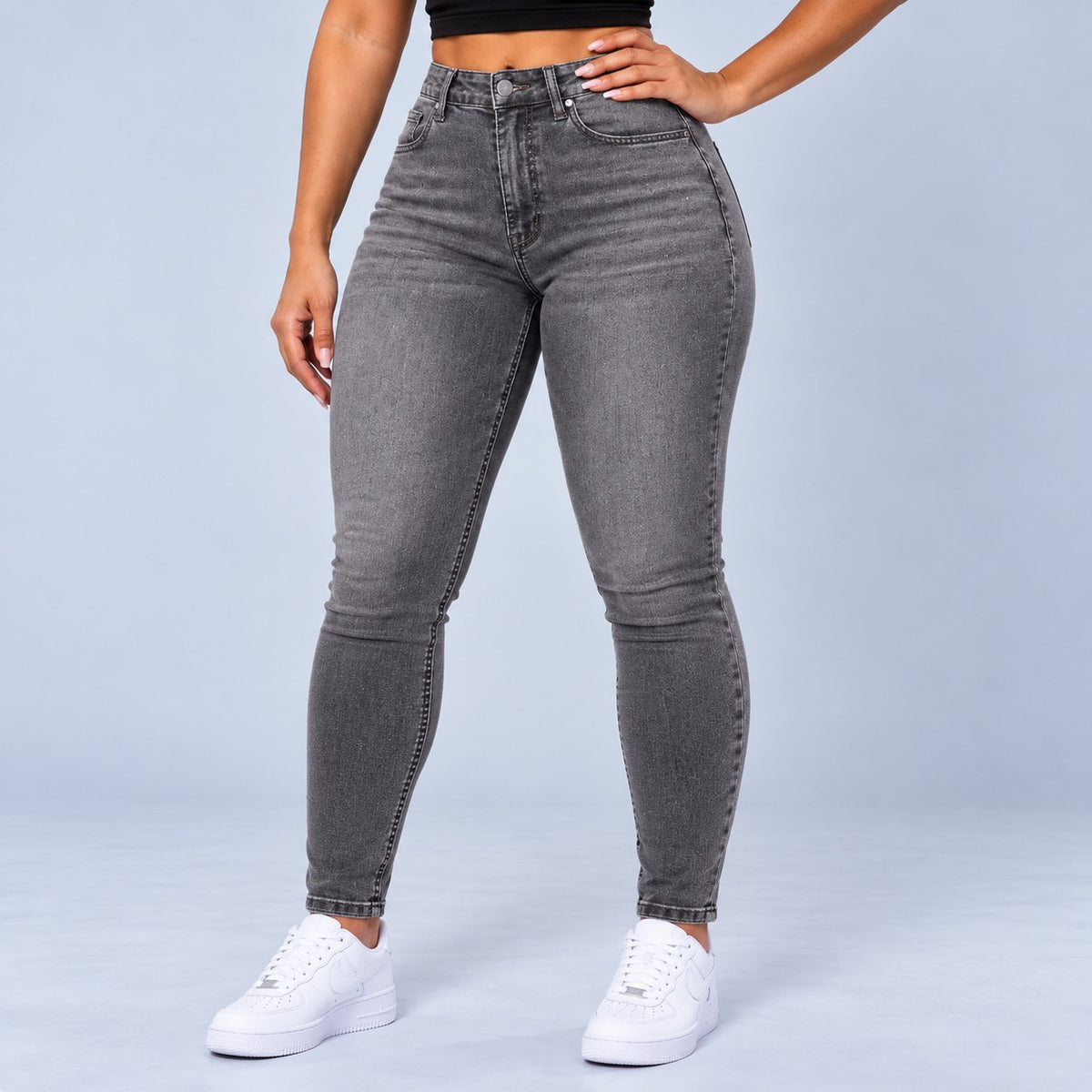 Sculpt Skinny BBL jean in grey, front view, hand on hip