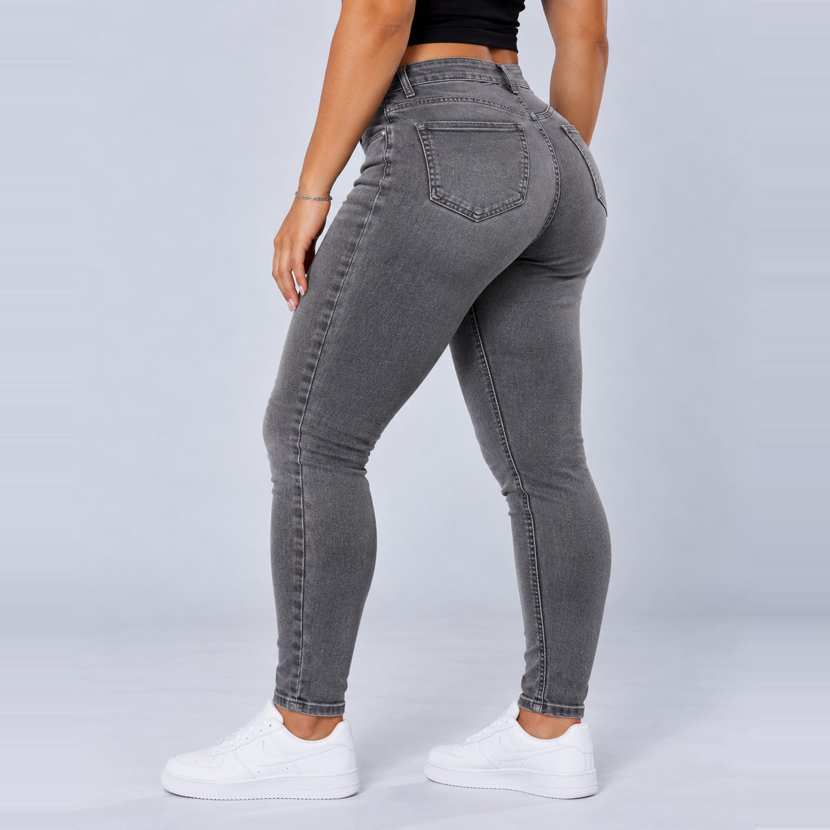 Sculpt Skinny BBL jean in grey, three-quarter back view