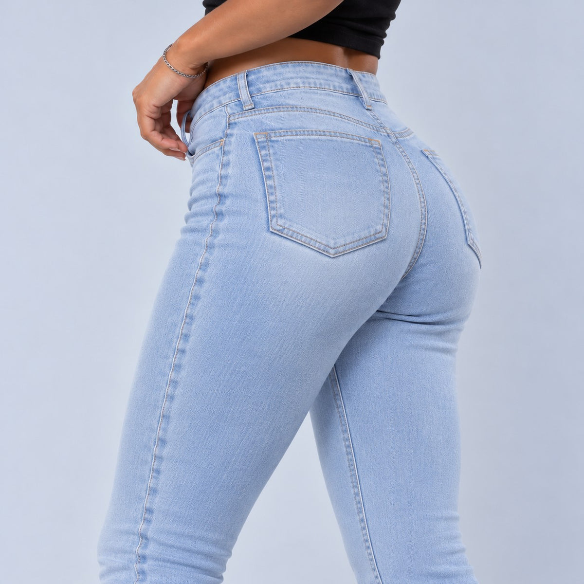 Sculpt Skinny BBL jean in light blue, three-quarter back close-up