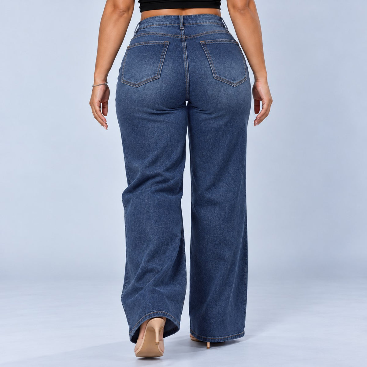 Sculpt Wide Leg BBL jean in dark blue, walking back view