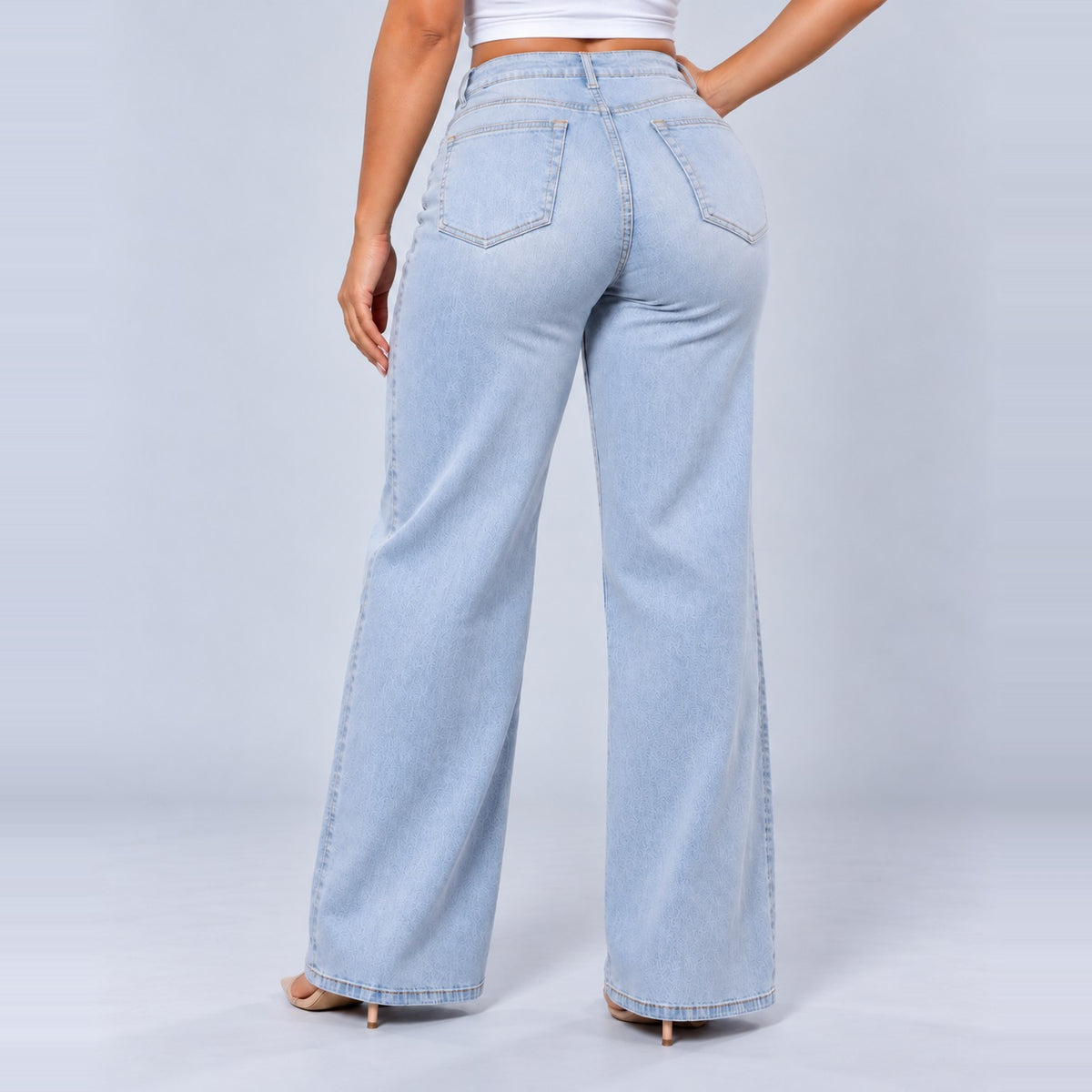 Sculpt Wide Leg BBL jean in light blue, back view, hand on hip