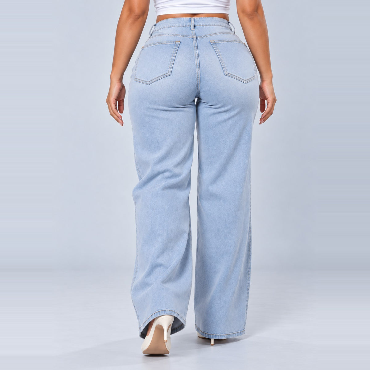 Sculpt Wide Leg BBL jean in light blue, walking back view